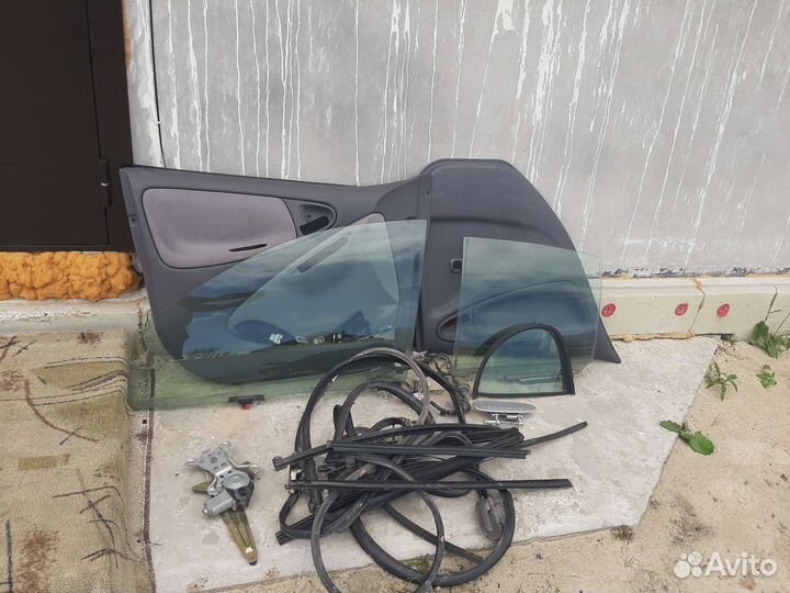 Продам обшивку дверей Toyota Platz левая сторона