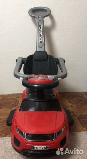 Машинка каталка с ручкой