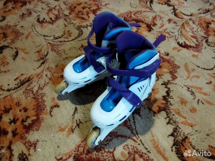 Роликовые коньки