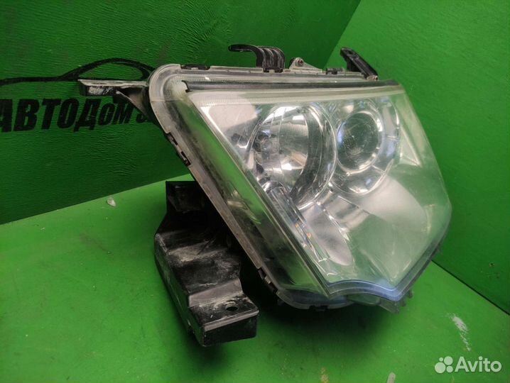 Фара левая Mitsubishi Pajero Sport 2