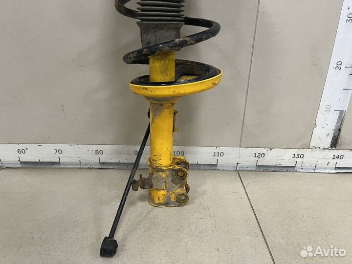 Амортизатор передний левый Suzuki Liana 2001-2007