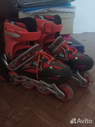 Роликовые коньки