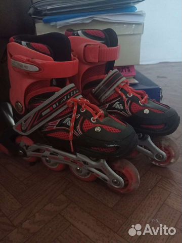 Роликовые коньки
