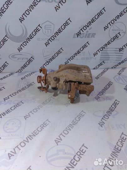 Суппорт тормозной задний левый Geely Emgrand EC7