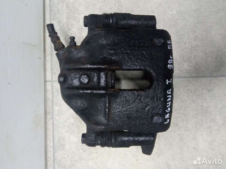 Суппорт тормозной передний правый Renault Laguna 1