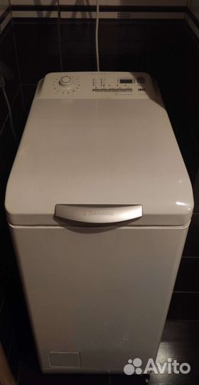 Стиральная машина с вертикальной загрузкой