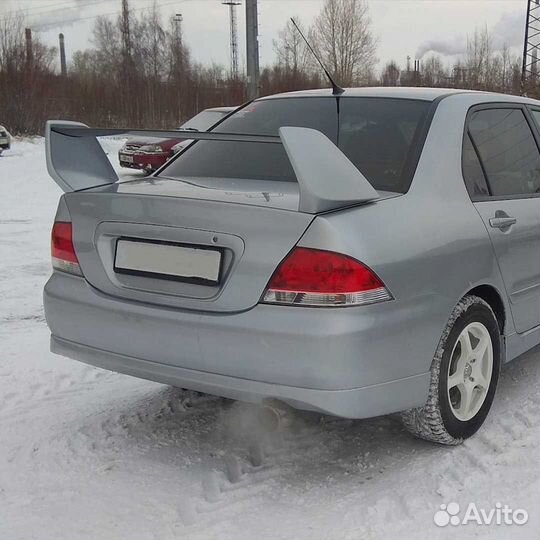 Юбка заднего бампера 2.0 Митцубиси Лансер 9
