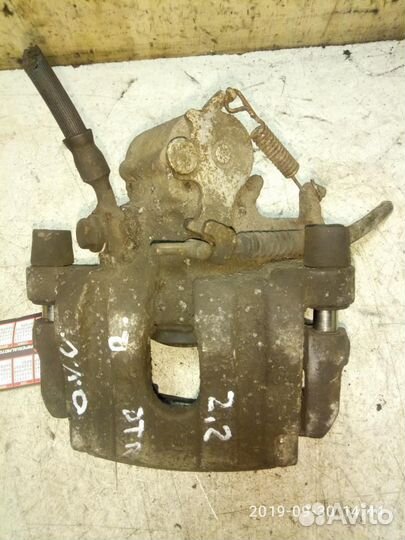 Суппорт задний правый Opel Vectra C