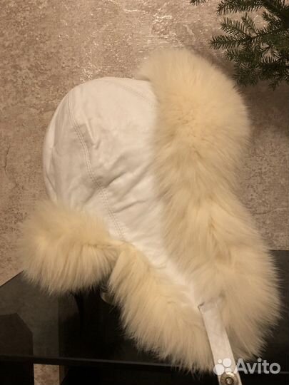 Женские меховые шапки