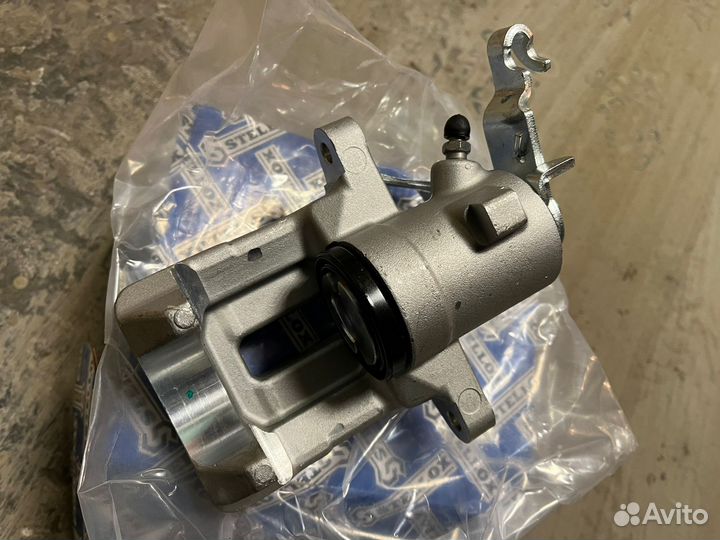 Суппорт тормозной задний левый