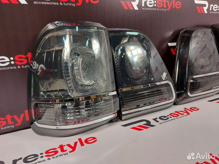 Стопы Toyota Land Cruiser 100 дымчатые T1826