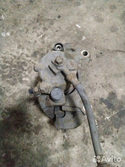 Суппорт передний левый Opel Astra H хетчбэк 5-ти