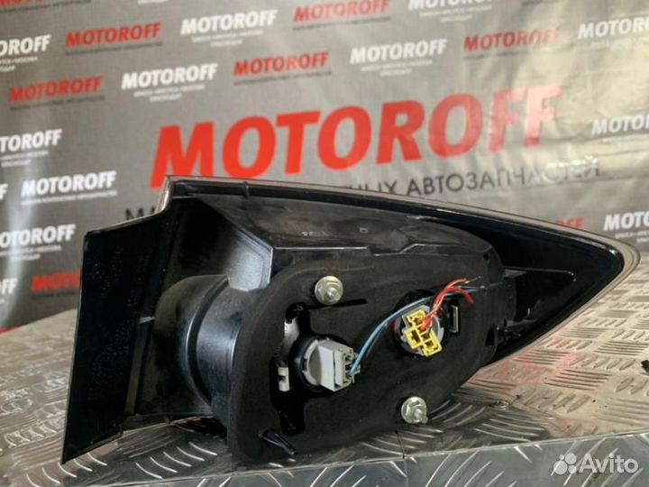 Стоп левый Аксела BK5P седан (2 модель) 6340 А242