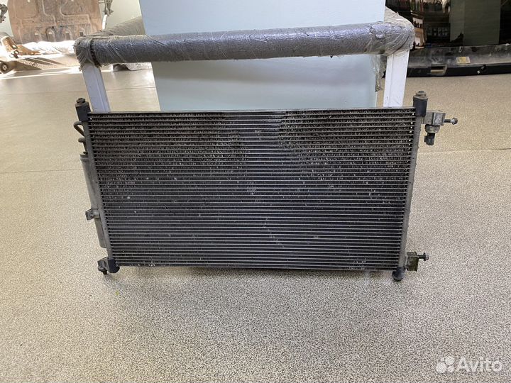 Радиатор кондиционера Nissan Tiida
