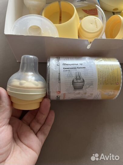 Молокоотсос medela swing электрический