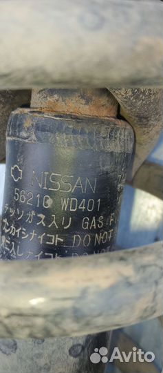 Задний амортизатор Ниссан wingroad