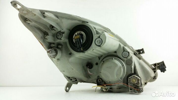 Фара левая Toyota Isis ANM10 2008