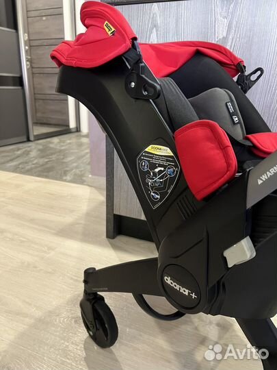 Коляска автокресло doona с базой isofix