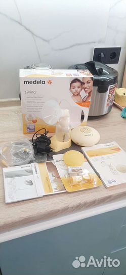 Молокоотсос medela swing