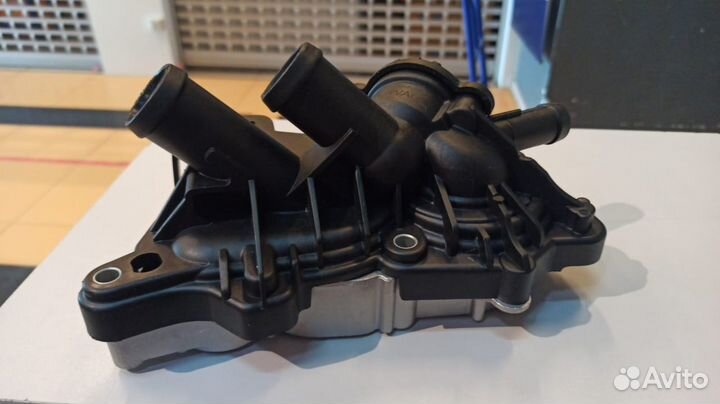 Помпа с термостатом в сборе VAG 1.2 1.4 оригинал