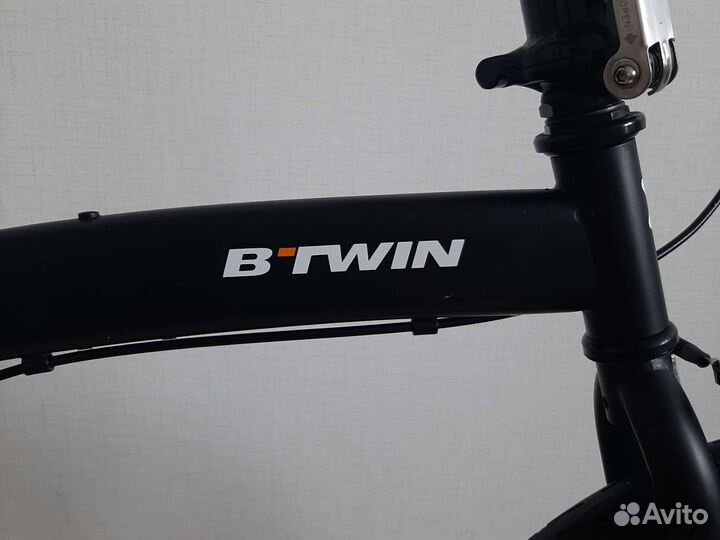 Btwin hoptown складной велосипед