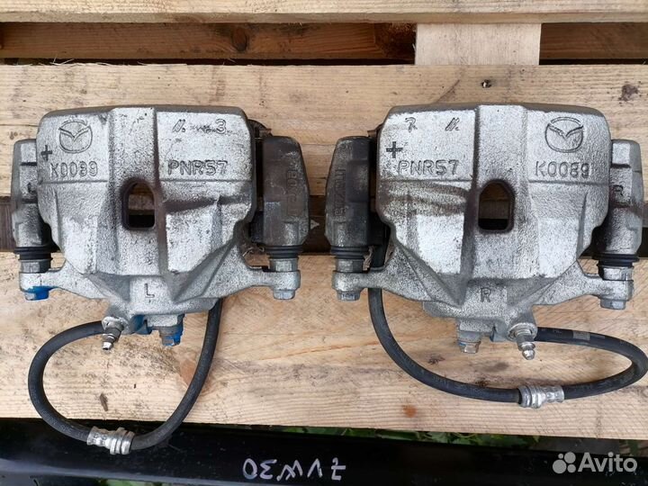 Передний тормозной суппорт мазда 6 GJ