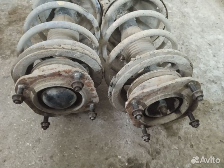 Стойки передние Мазда 626 GD