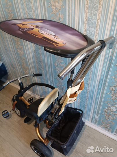 Трехколесный велосипед с ручкой