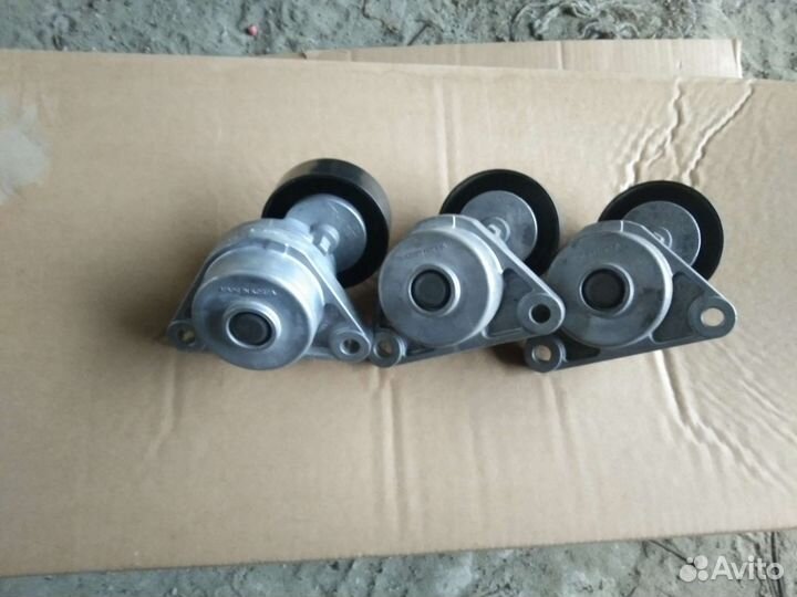 Натяжитель ремня Chevrolet Lacetti Aveo 1,6 1,4