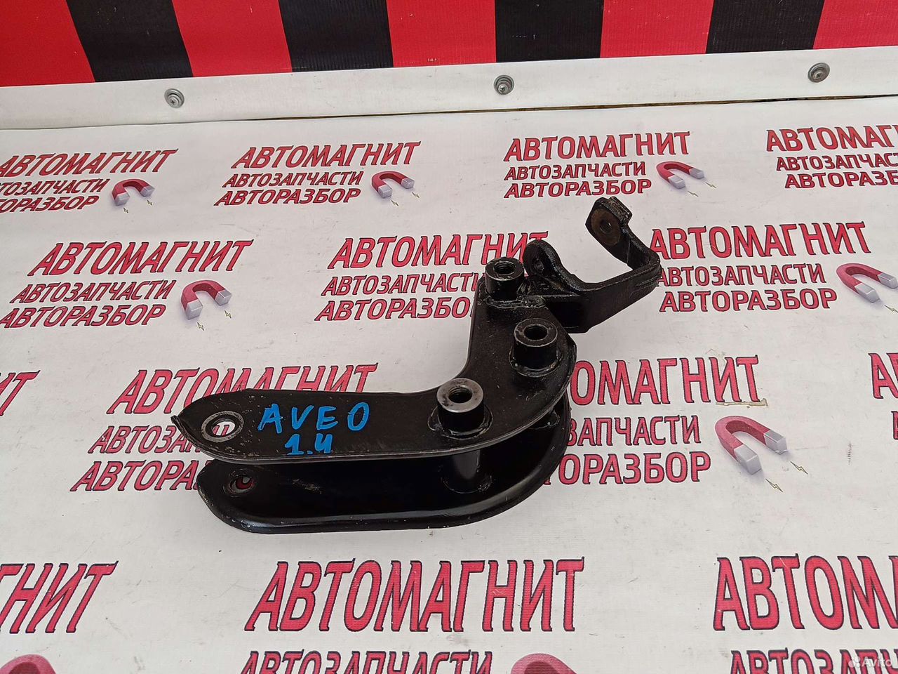 Кронштейн крепления МКПП Шевроле Авео 1.4
