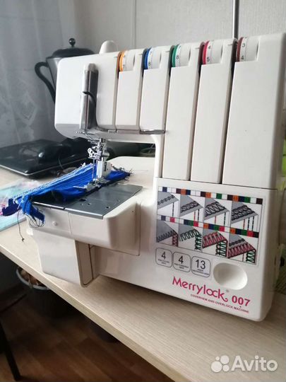 Коверлок Merrylock 007 белый