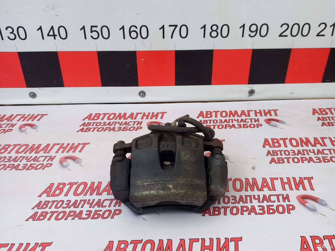 Супорт тормозной передний левый Хендай Соната 7 LF