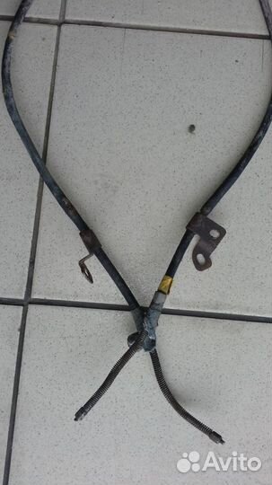 Тросик ручника Geely MK