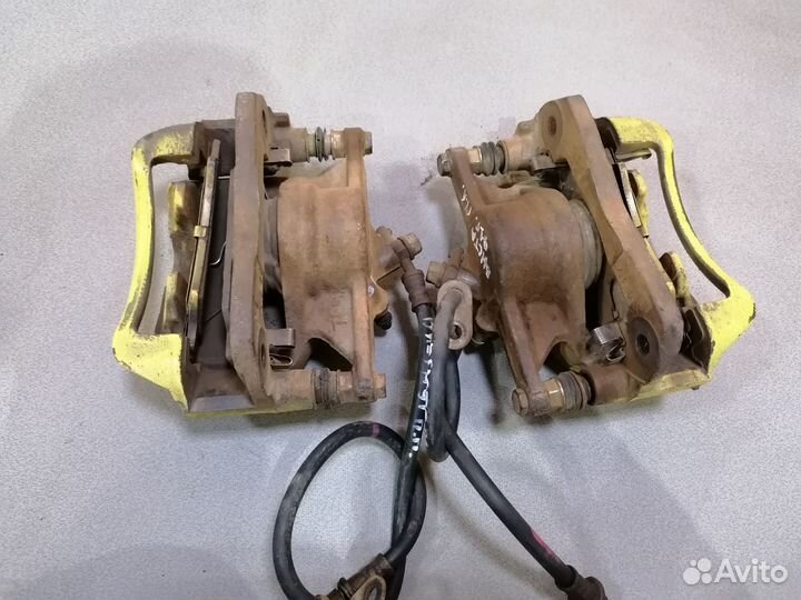 Суппорт тормозной передний Toyota Vista 91