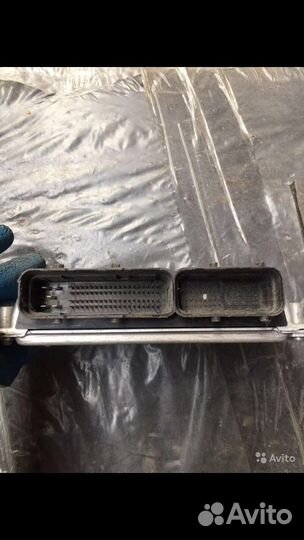 Блок управления двигателем KIA Spectra 39110-2x335