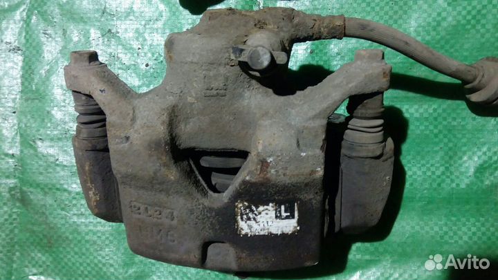 Суппорт тормозной Шевроле Кобальт передний