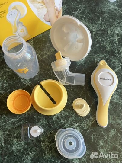 Молокоотсос medela