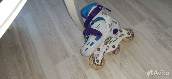 Роликовые коньки