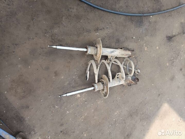 Передние стойки на Киа Спортайдж