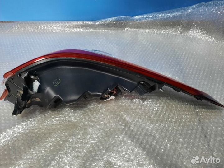 Фонарь наружный задний левый Toyota Camry V70