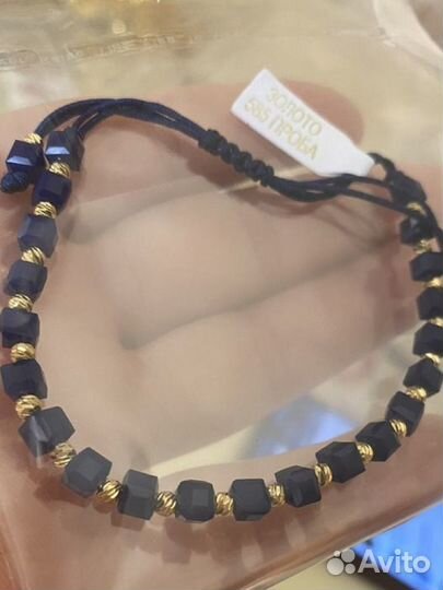 Золотые браслеты на нитках