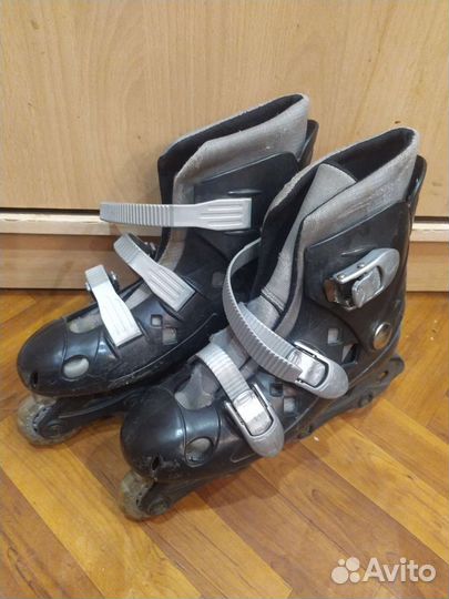 Роликовые коньки и шлем