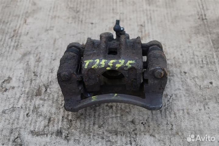 Суппорт тормозной задний левый Kia Sportage 2