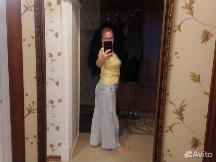 Джинсы клеш