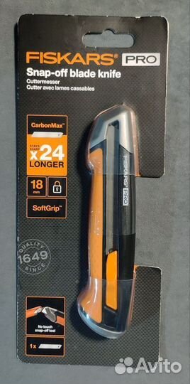 Нож строительный Fiskars