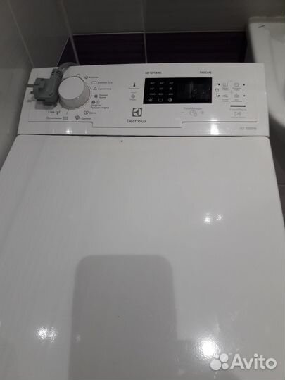 Стиральная машина б/у с вертикальной загрузкой