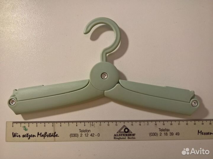 Портативная складная вешалка для одежды