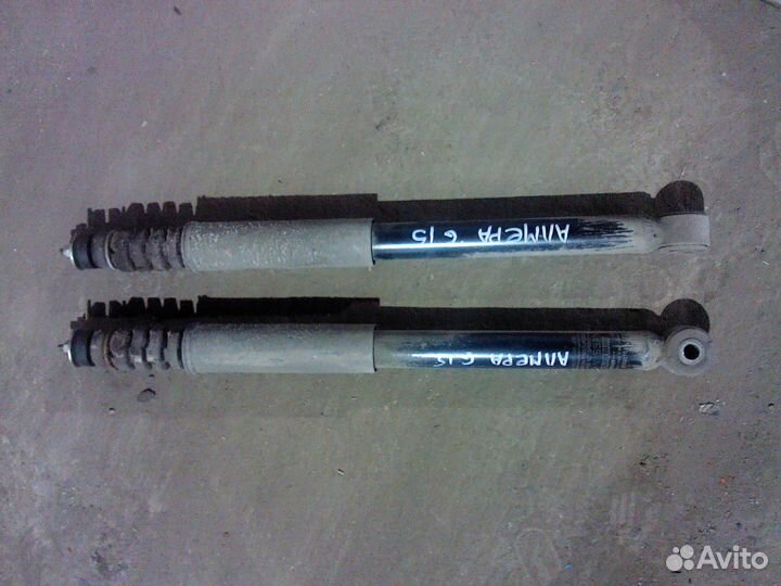 Амортизатор задний Nissan Almera G15