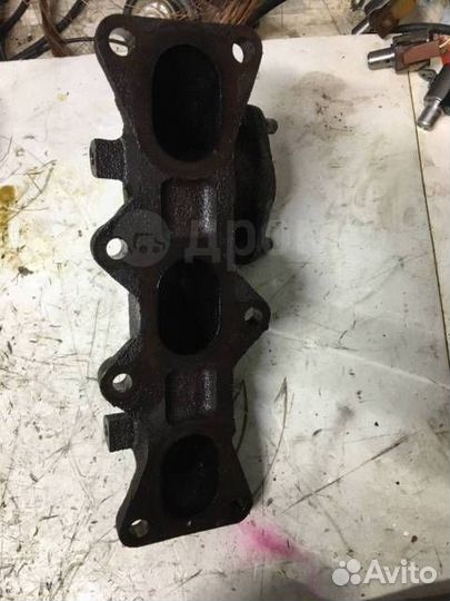 Коллектор выпускной Mazda 323F BA