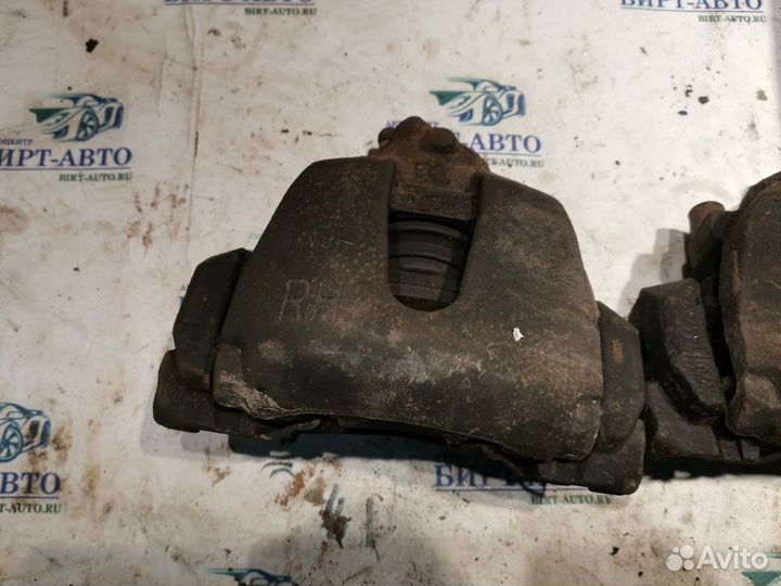 Суппорт тормозной передний Ford Focus III (2011—20